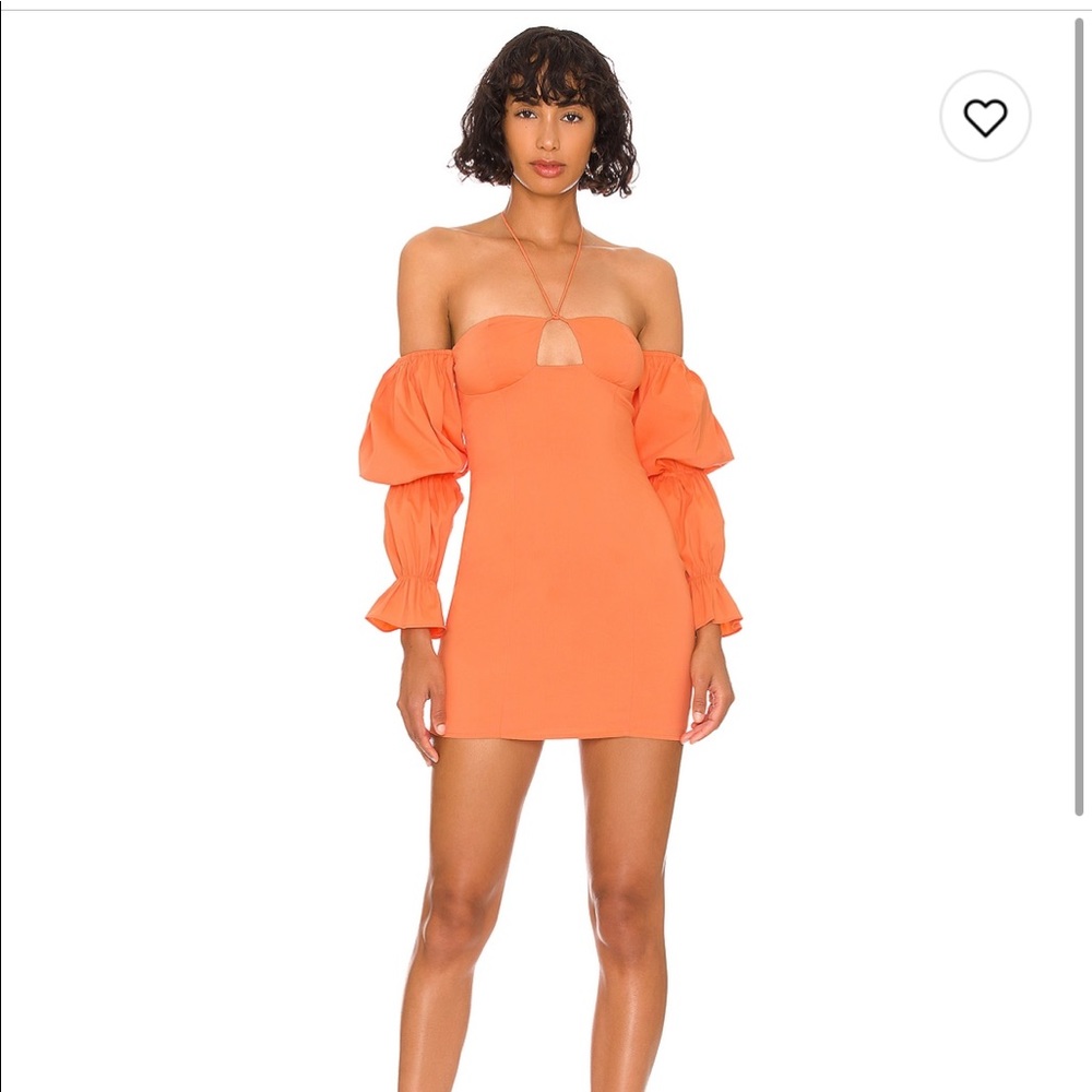 Size small dress form Revolve. Only worn once and is an orange/rust color.